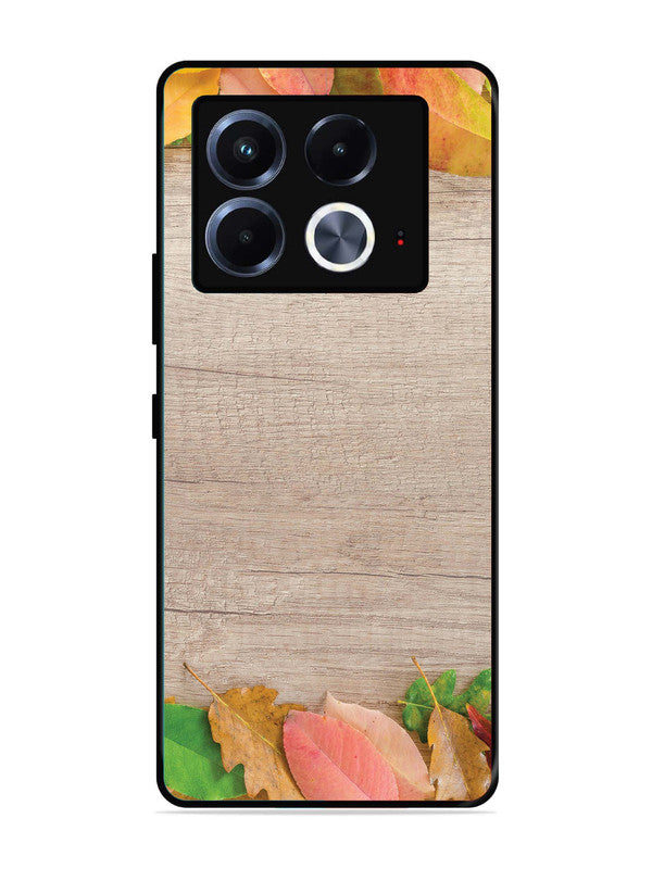 Infinix Note 40 5G Autumn Leafs On Wooden Table