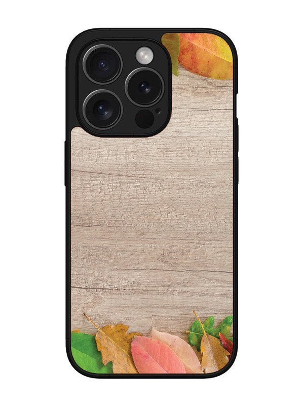 iPhone 15 Pro Max Autumn Leafs On Wooden Table