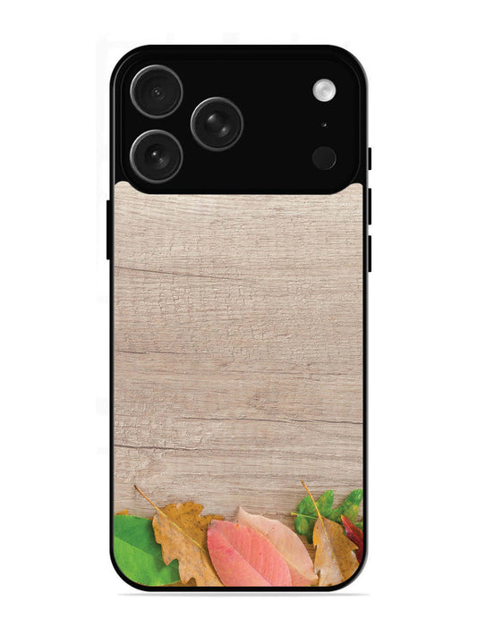 iPhone 17 Pro Autumn Leafs On Wooden Table