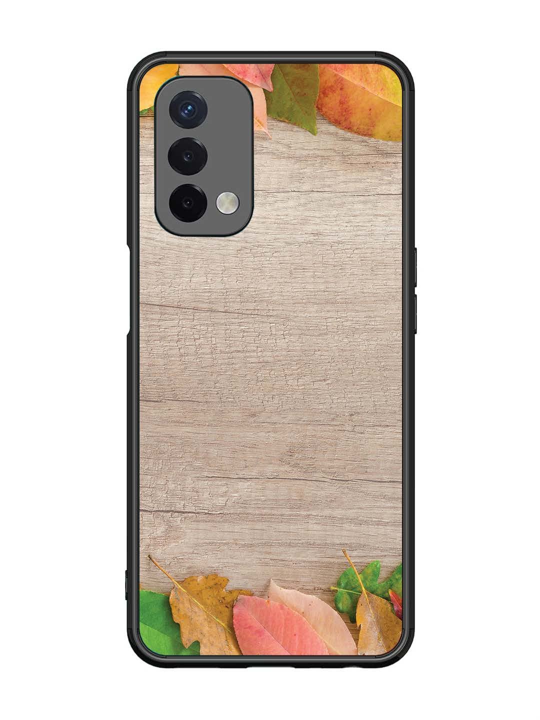 Oppo A74 5G Autumn Leafs On Wooden Table