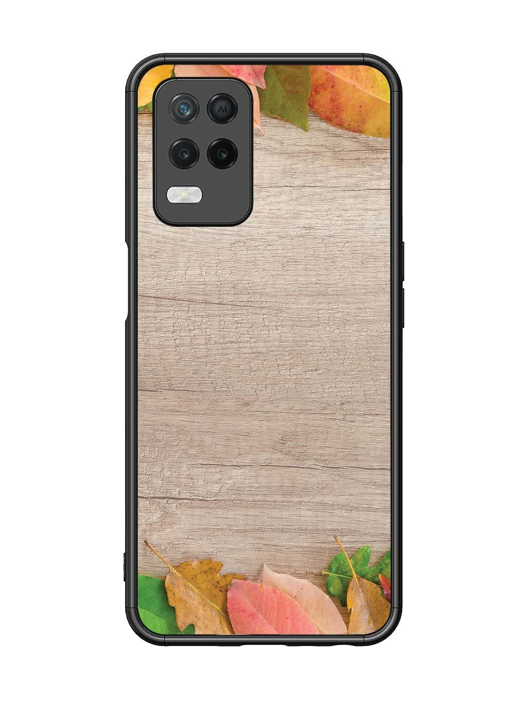 Realme 8 5G Autumn Leafs On Wooden Table